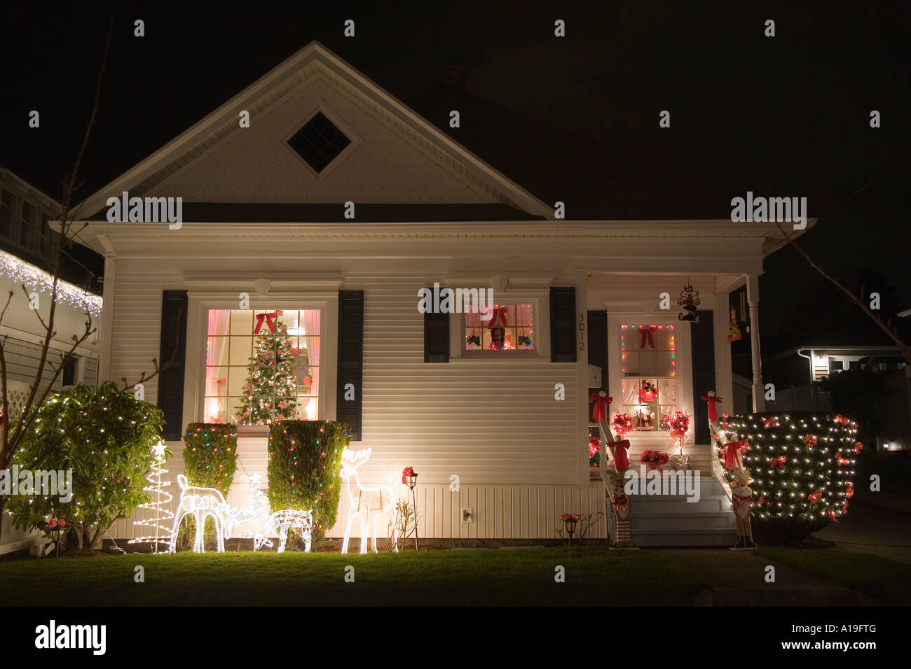 Christmas light displays on houses in Seattle Washington Stock Photo