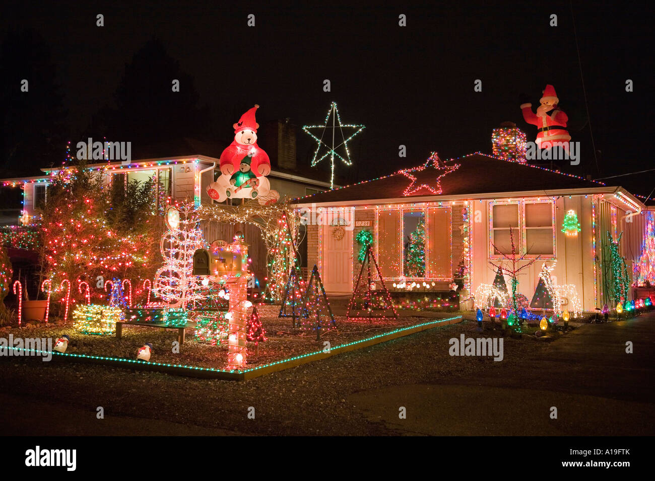Christmas light displays on houses in Seattle Washington Stock Photo