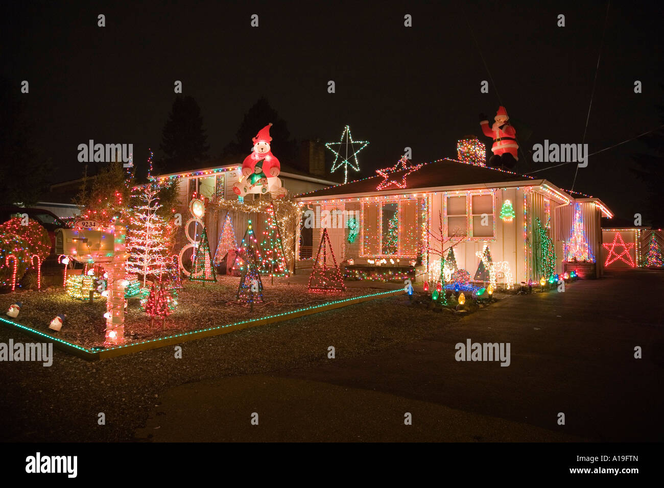 Christmas light displays on houses in Seattle Washington Stock Photo