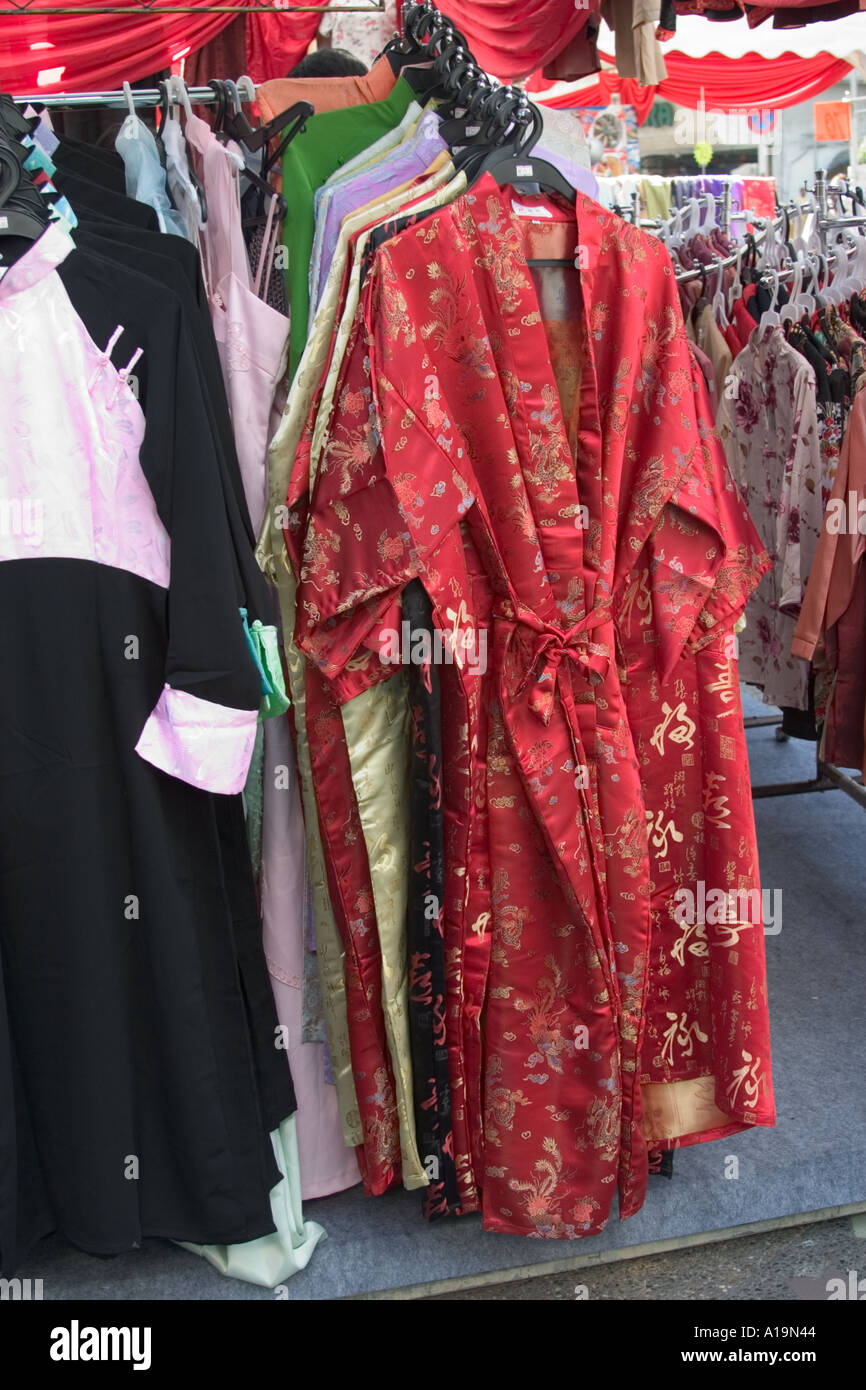 chinese clothes on stall display traditional fashion Stock Photo