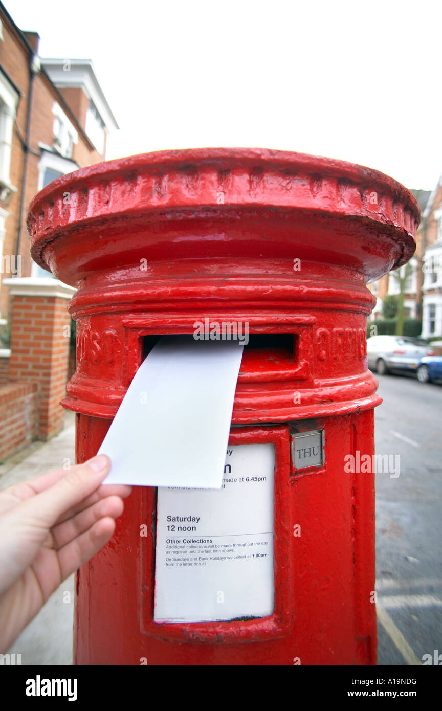 posting letter in UK Postbox Stock Photo