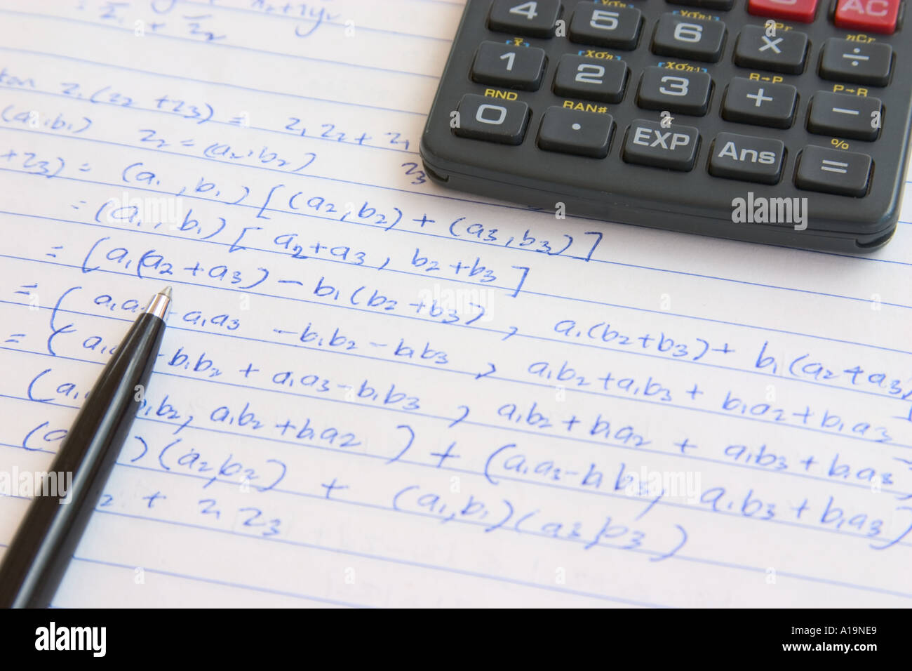 pen calculator and college mathematics homework concept education Stock