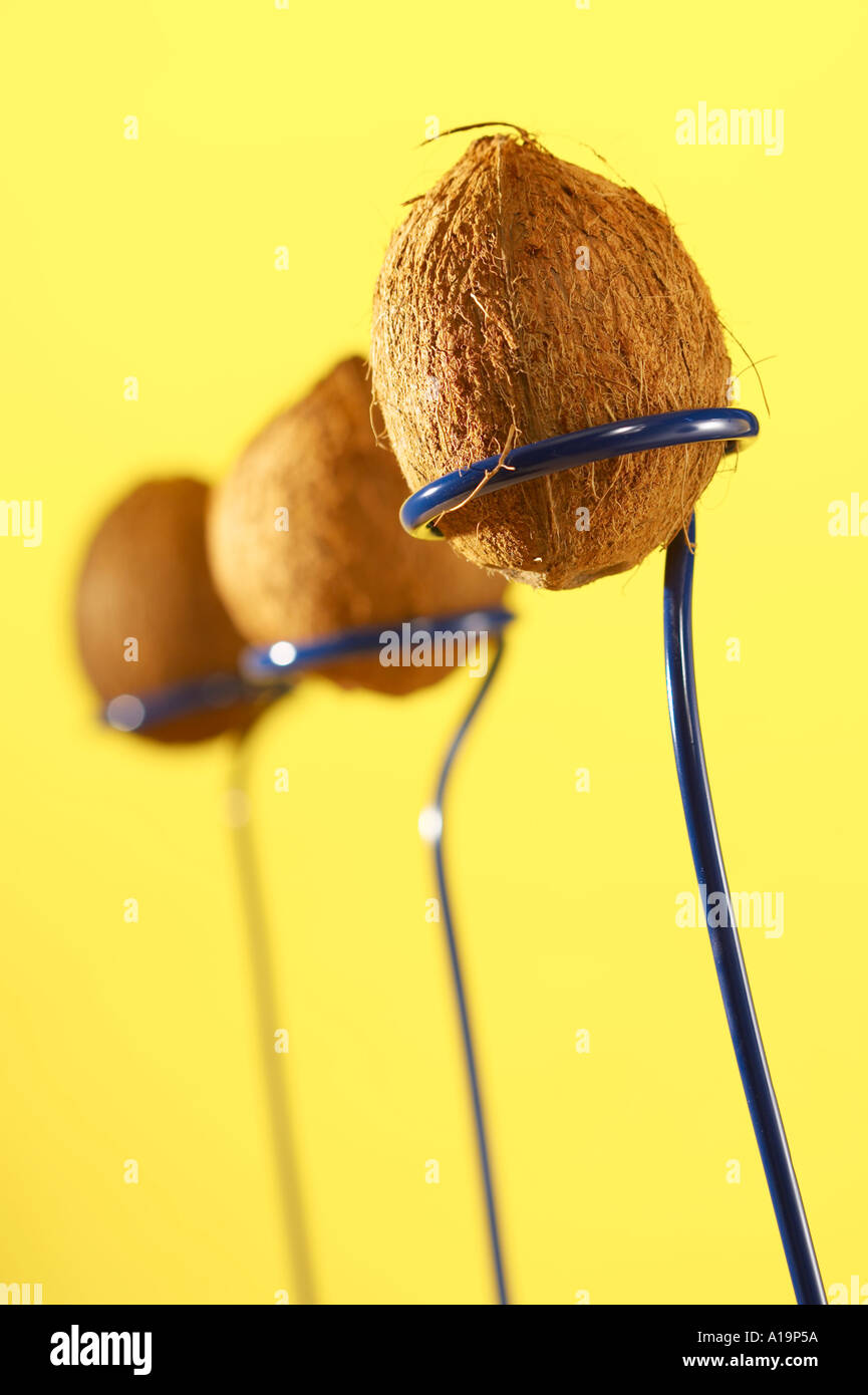 Coconut shy three in a row Portrait Stock Photo Alamy