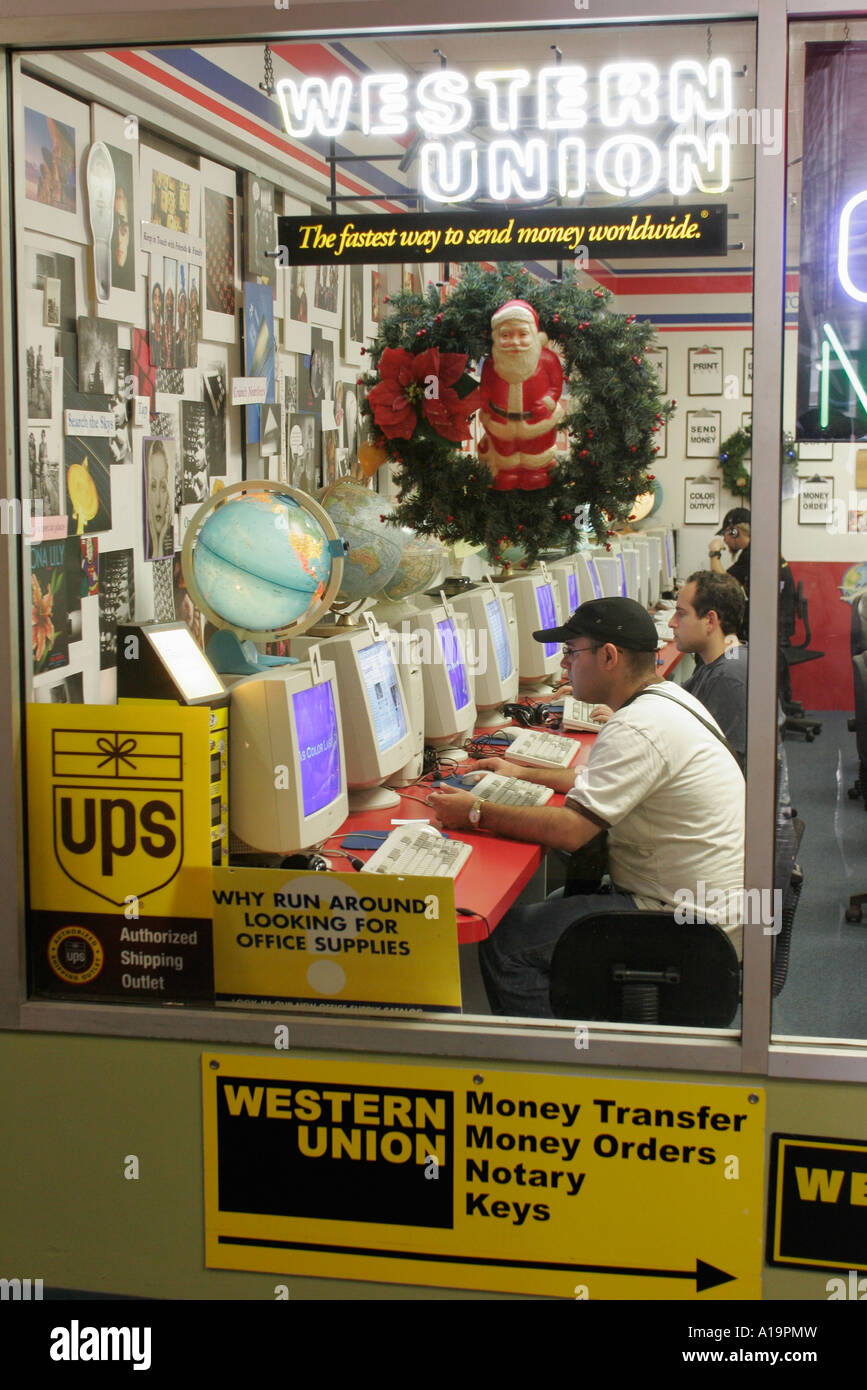 Miami Florida,Flagler Street,Internet access,Western Union,money  orders,notary,UPS,FL061207080 Stock Photo - Alamy