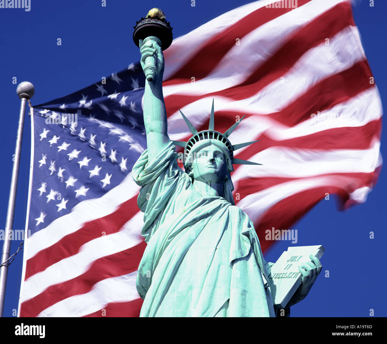 USA New York The Statue of Liberty and US Flag Stock Photo Alamy