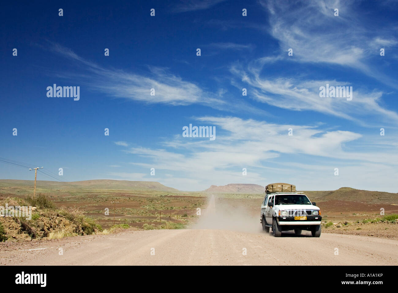 On tour with 4x4 on endless gravelroads, Namibia, Africa Stock Photo