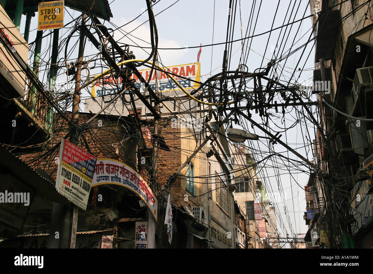 Delhi, India, power cords, chaos, criss-cross above the streets, Downtown, Stock Photo