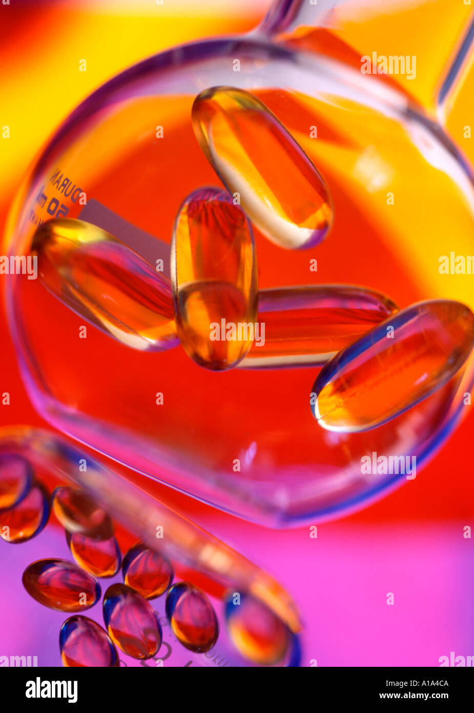 Food oil supplements vitamin E and Garlic Stock Photo Alamy