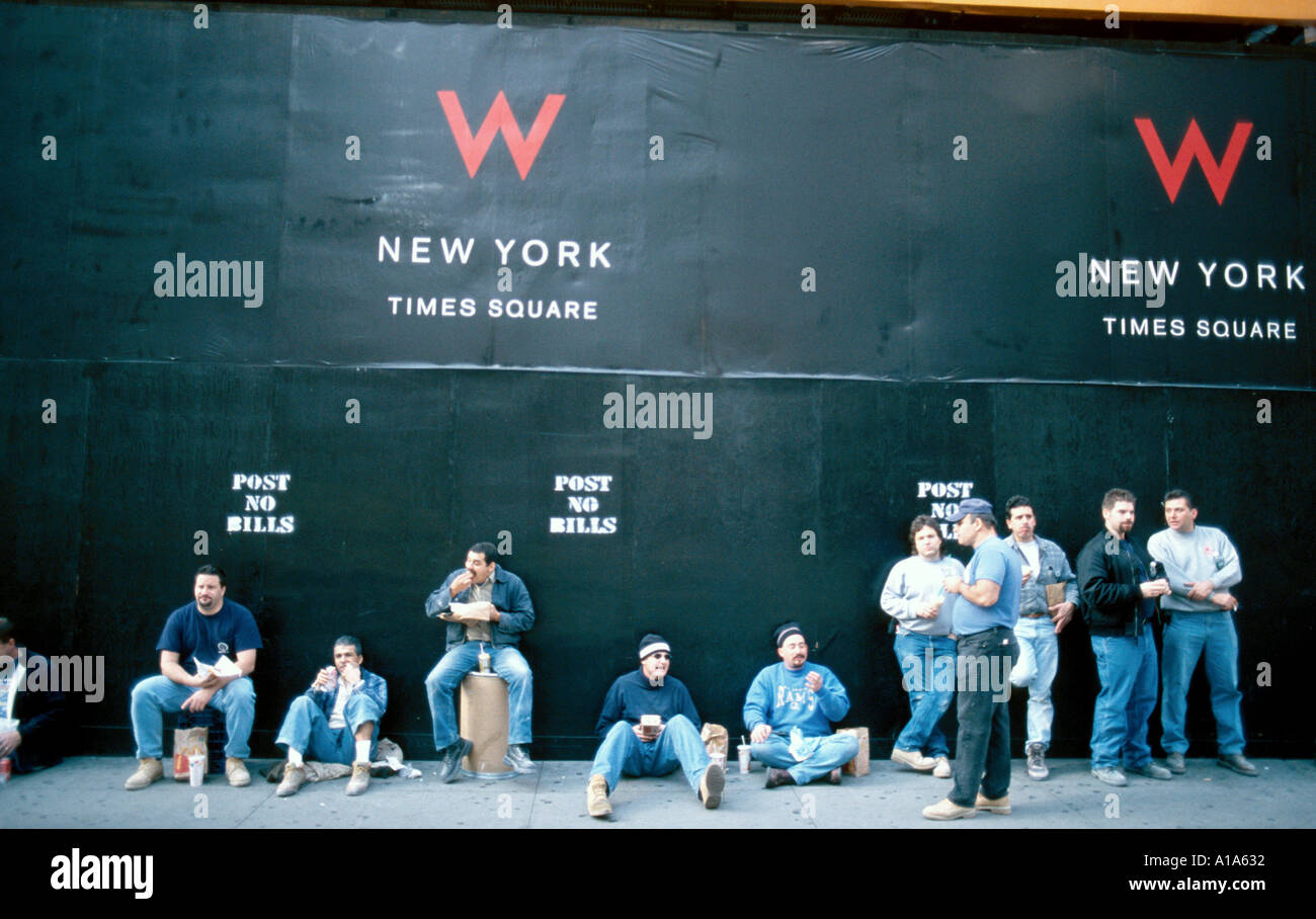 Construction workers at lunch Times Square New York USA Stock Photo Alamy