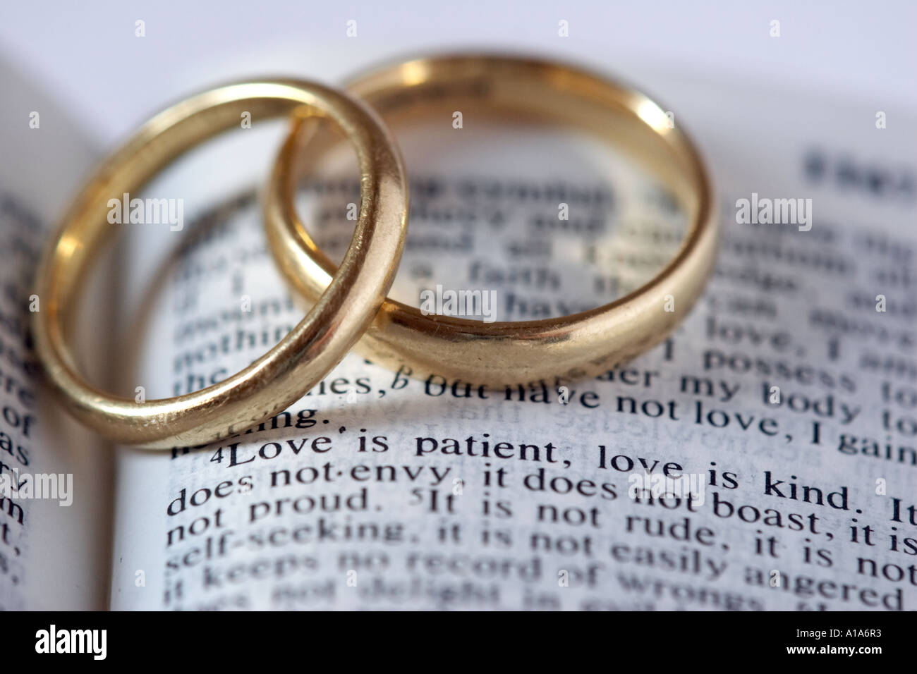 Wedding rings with Bible verse Stock Photo