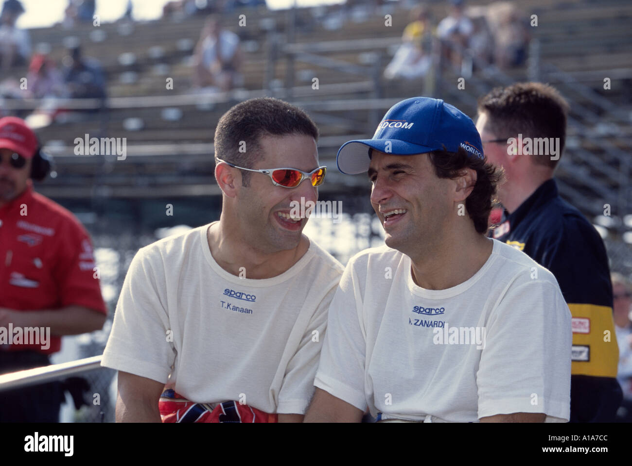 Team mates Tony Kanaan and Alex Zanardi share a laugh at the Detroit Grand Prix 2001 Stock Photo