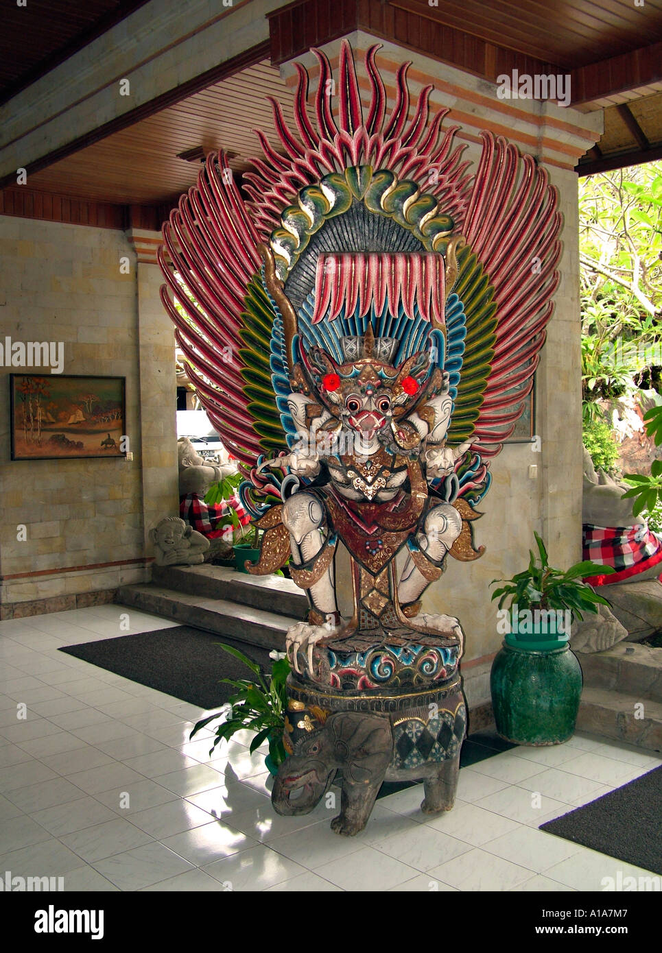 Iconic wood carving of Garuda, the mythical bird in hotel foyer ...