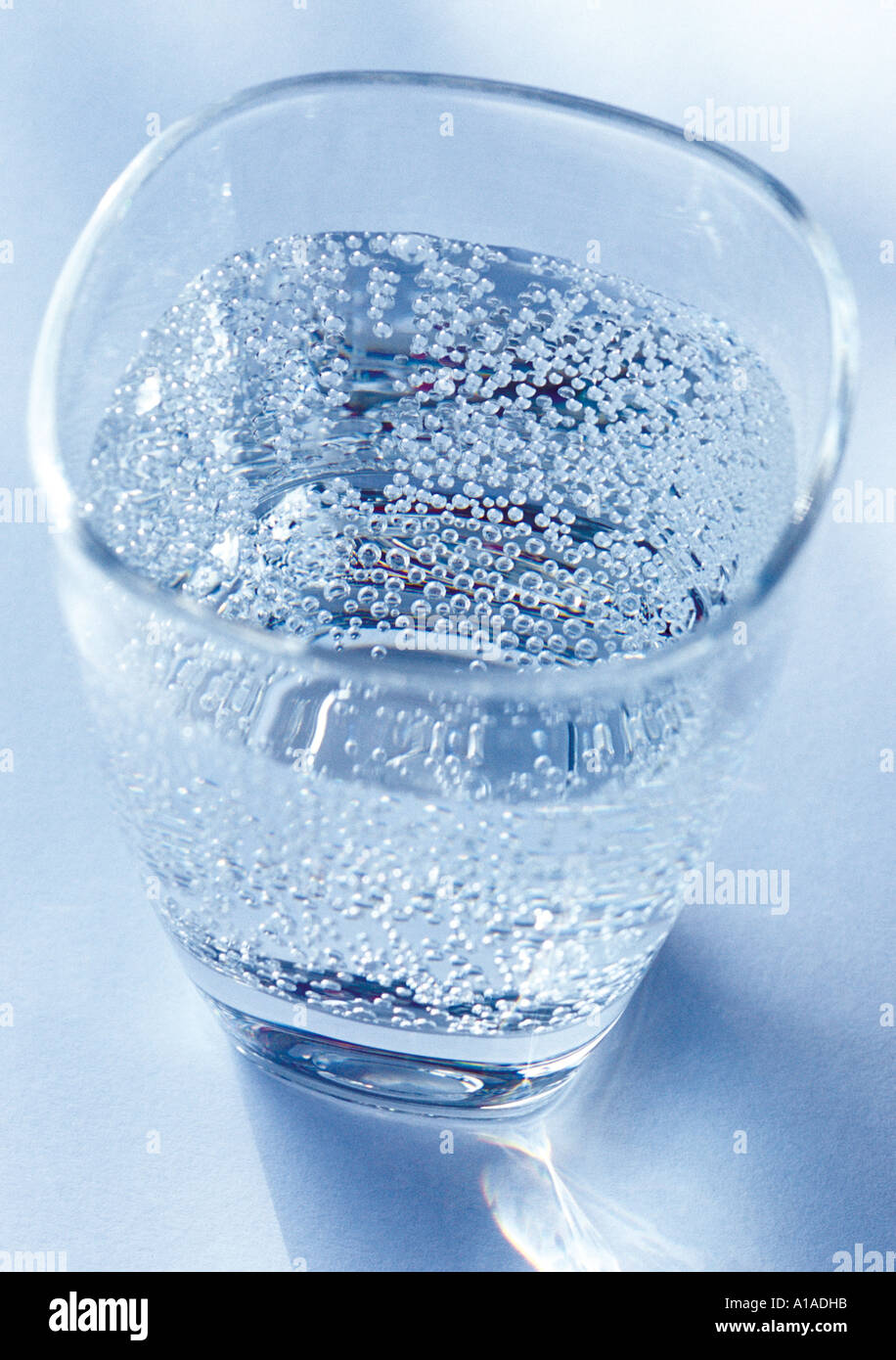 Glass of fizzy water Stock Photo Alamy
