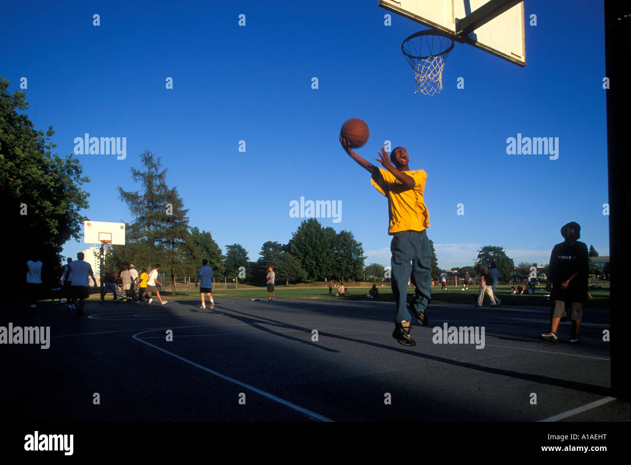 USA Washington Seattle Pickup basketball game in playgrounds at Green Lake  Park on Sunday afternoon Stock Photo - Alamy