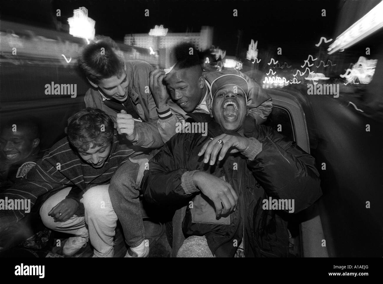 USA Nevada Las Vegas High school basketball team celebrates in back of pickup after winning tournament game BW Stock Photo