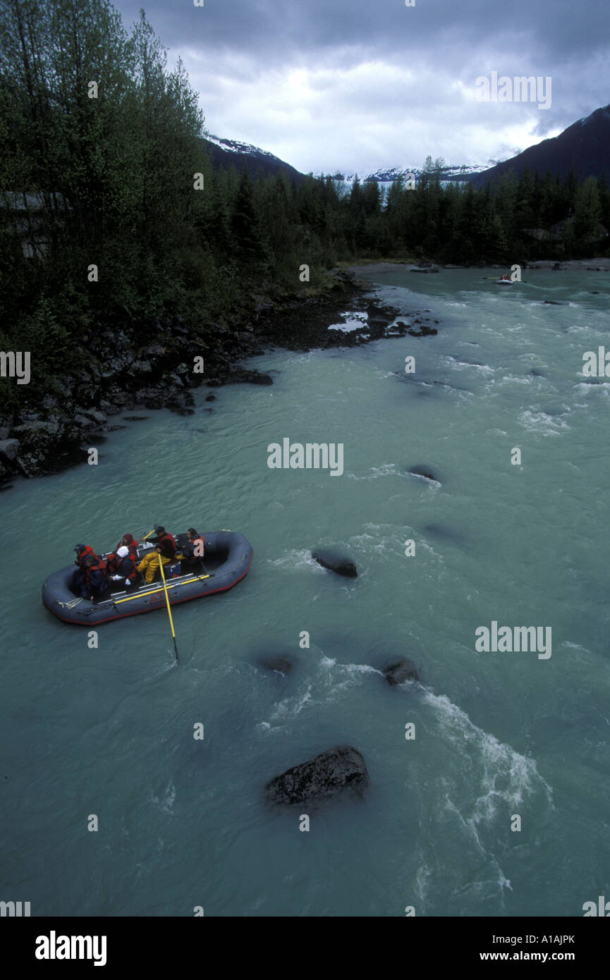 USA Alaska Juneau Whitewater rafters float down Mendenhall River near