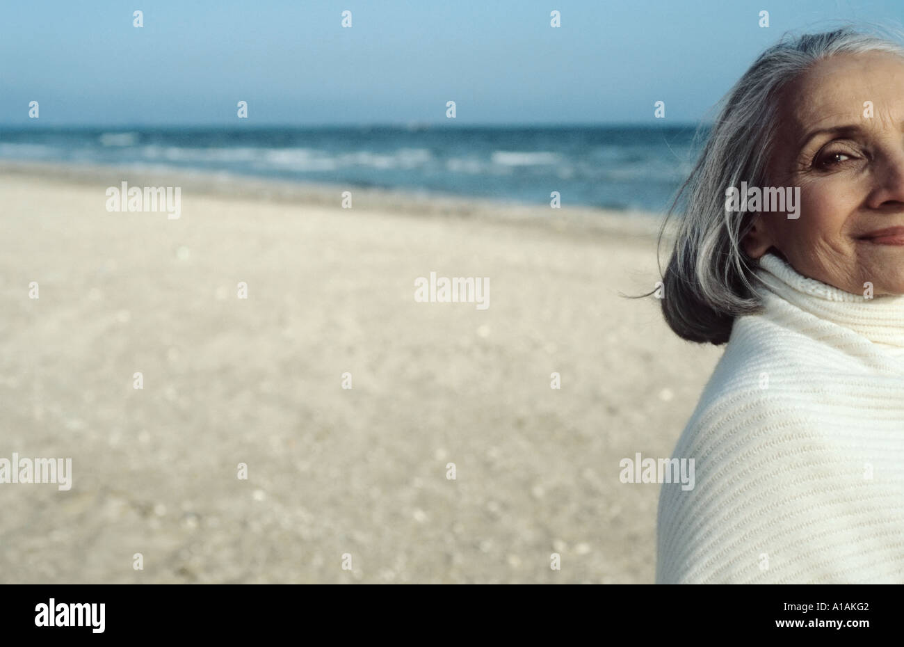 Senior woman looking beach hi-res stock photography and images - Alamy