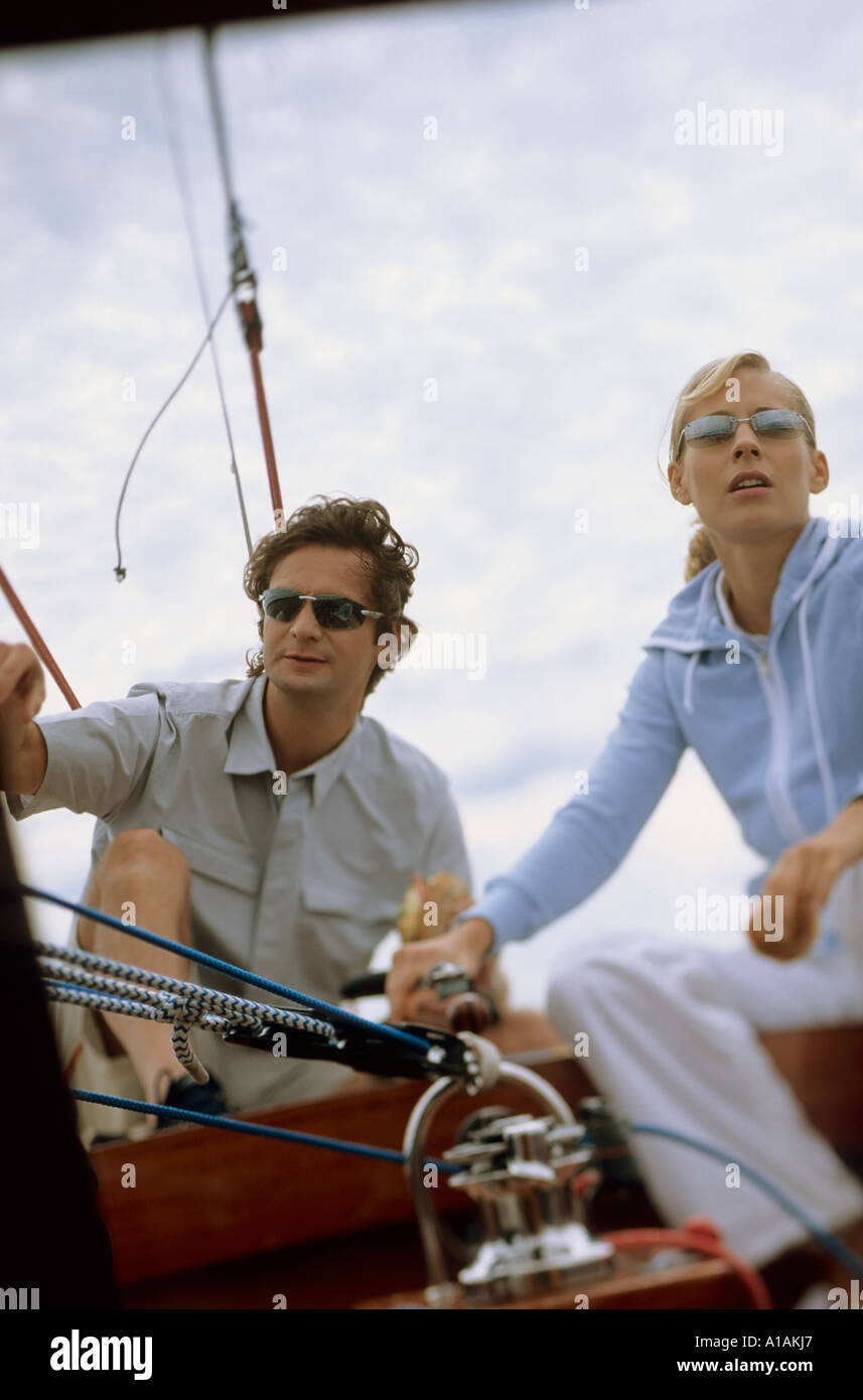 Couple sailing boat Stock Photo