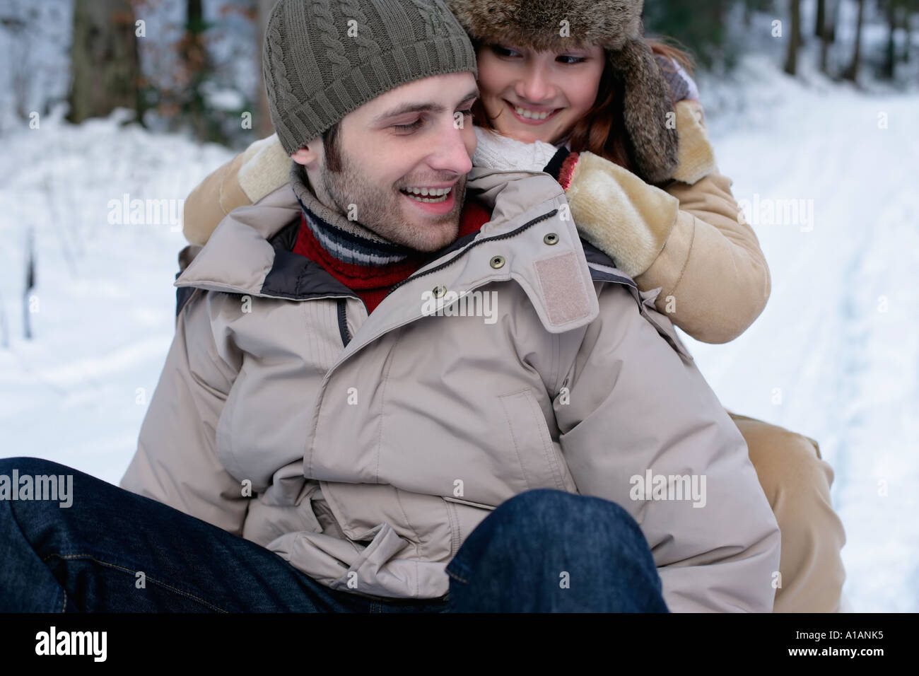 Couple on a sled Stock Photo