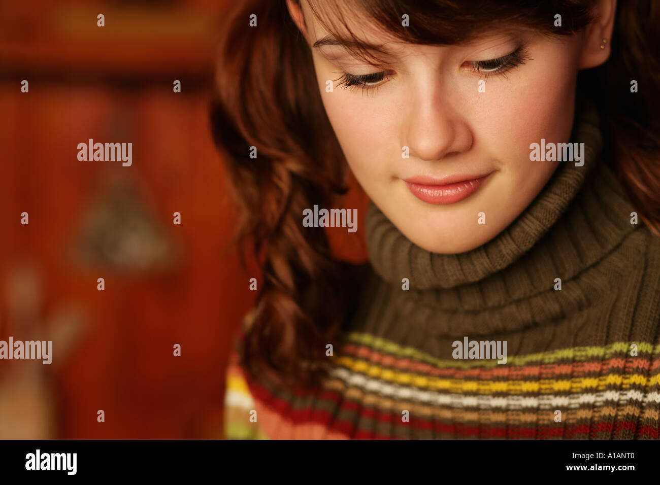 Young woman in roll neck sweater Stock Photo