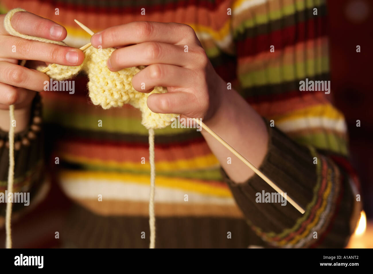 Young woman knitting Stock Photo