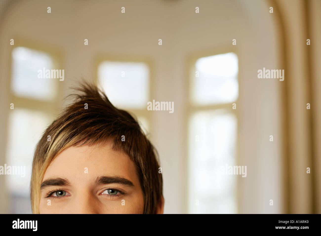 Man with funky hairstyle Stock Photo