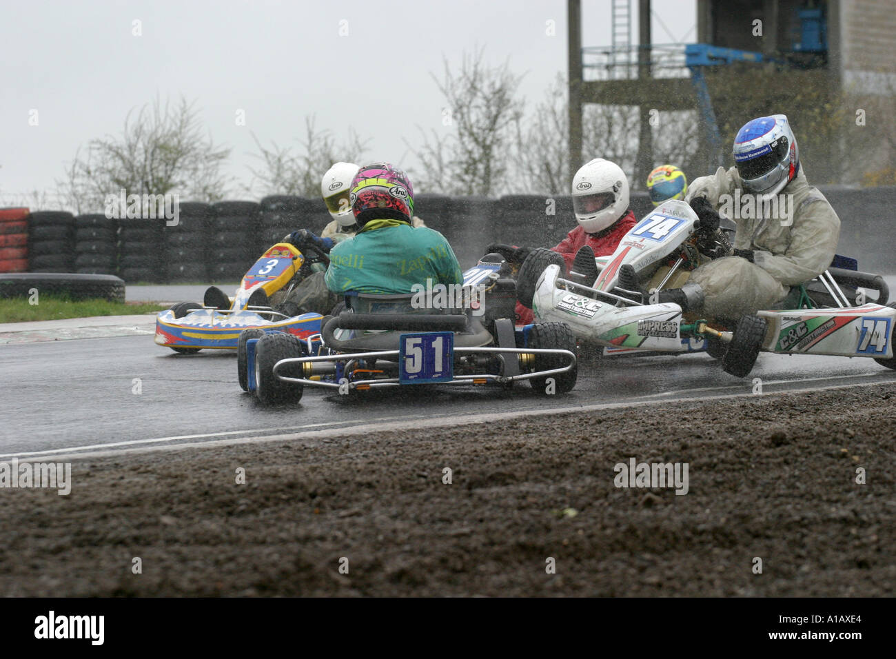 Crash in the wet during a rotax max kart race at a wet Nutts Corner