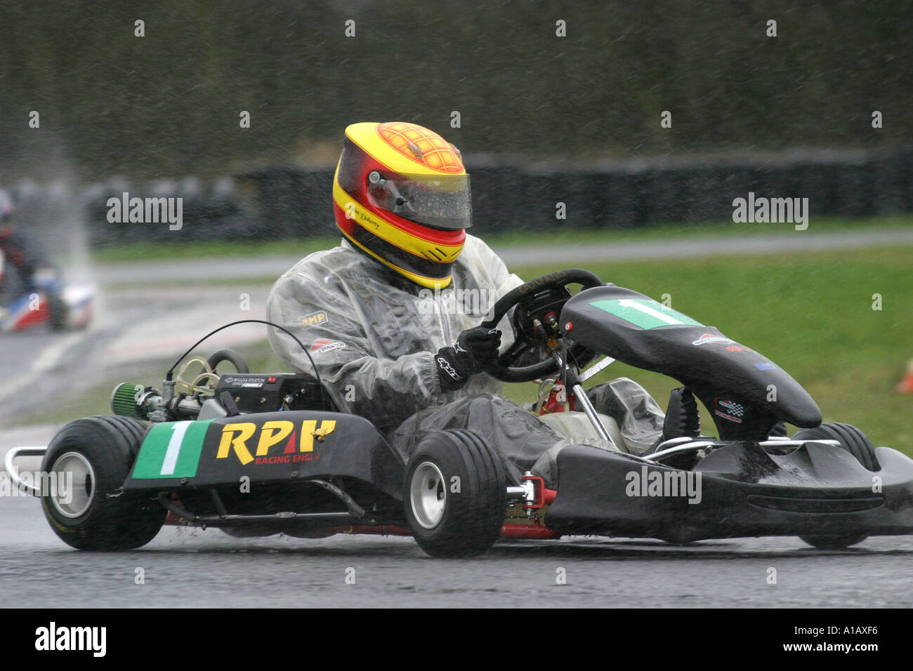 World Formula kart driver number one 1 at a wet Nutts Corner Motorsport