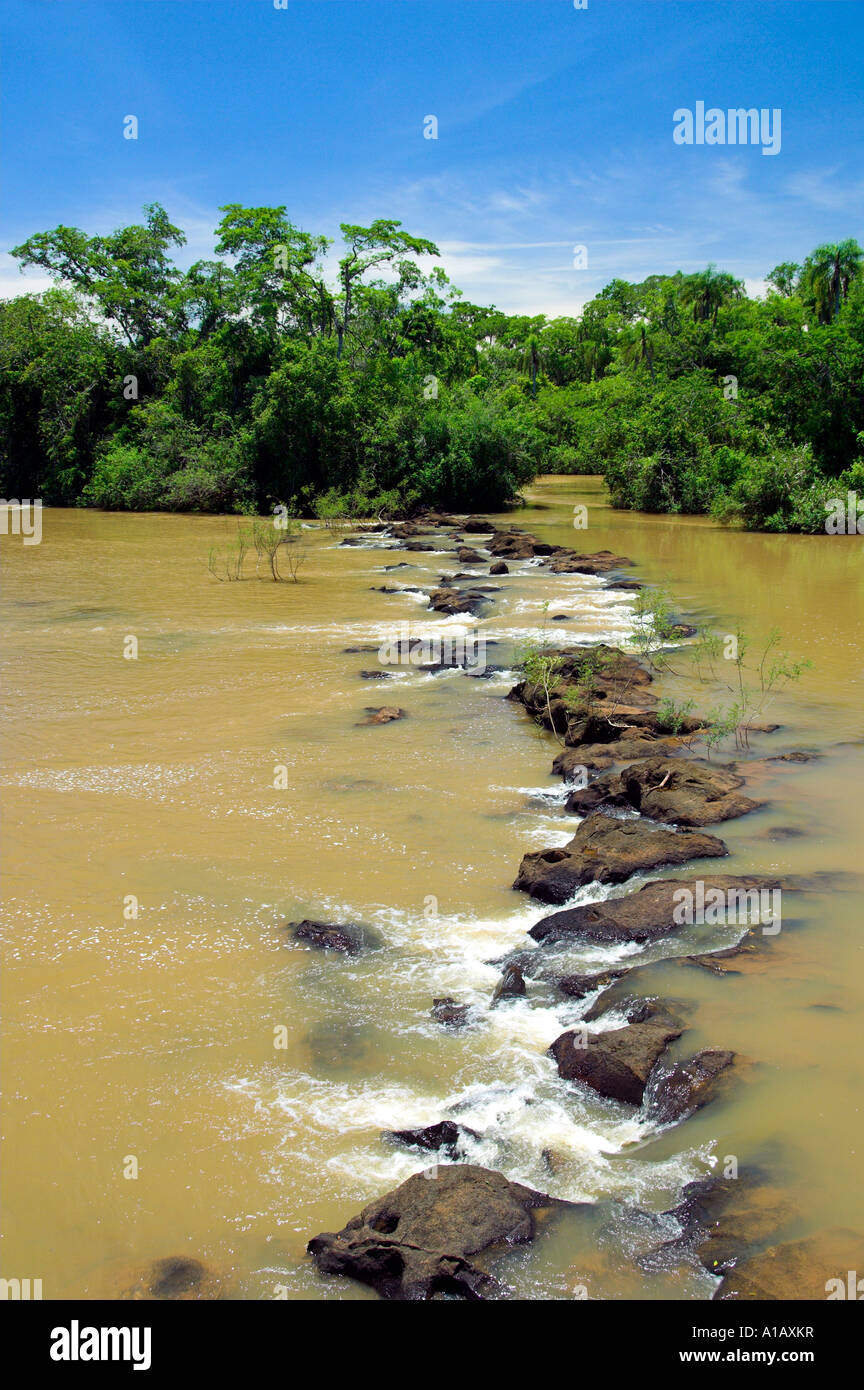 The Iguassu River flowing through Brazil and Argentina above the Iguassu Falls Stock Photo