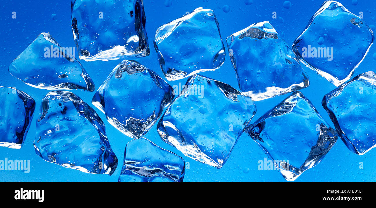 ICE CUBES ON BLUE Stock Photo