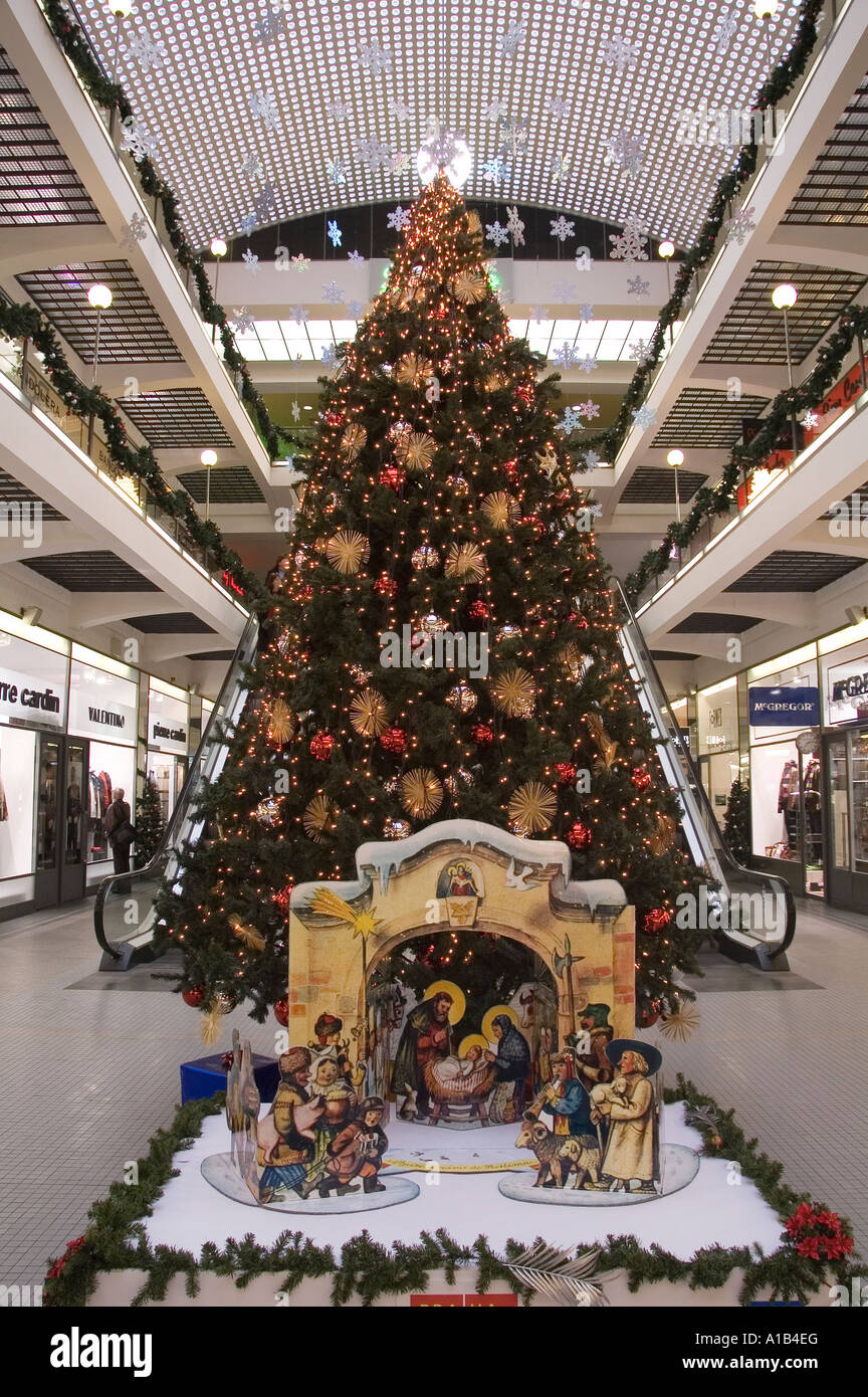 A fully decorated Christmas tree displayed inside a shopping mall in Nove Mesto district Prague Czech Stock Photo