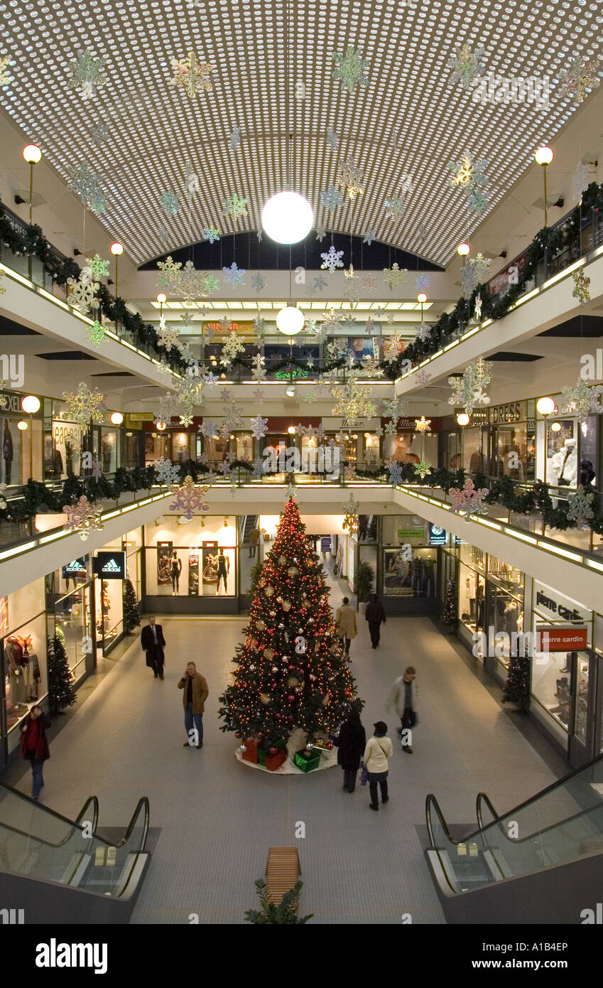 A fully decorated Christmas tree displayed inside a shopping mall in Nove Mesto district Prague Czech Stock Photo