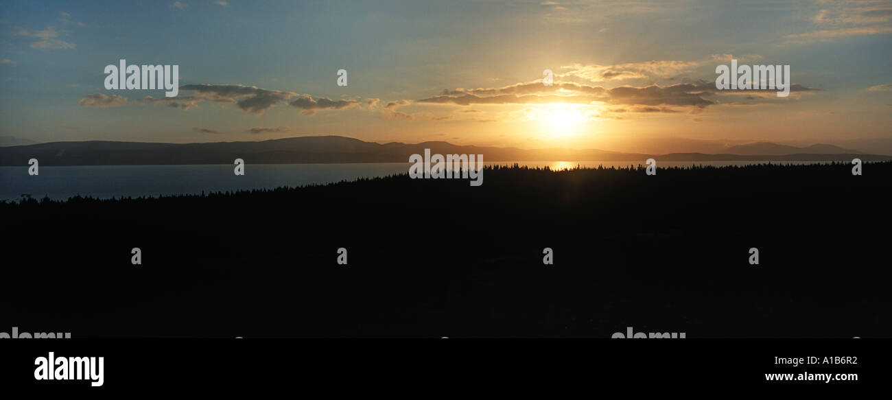 Low golden sun over Lake Tekapo South Island New Zealand Stock Photo ...