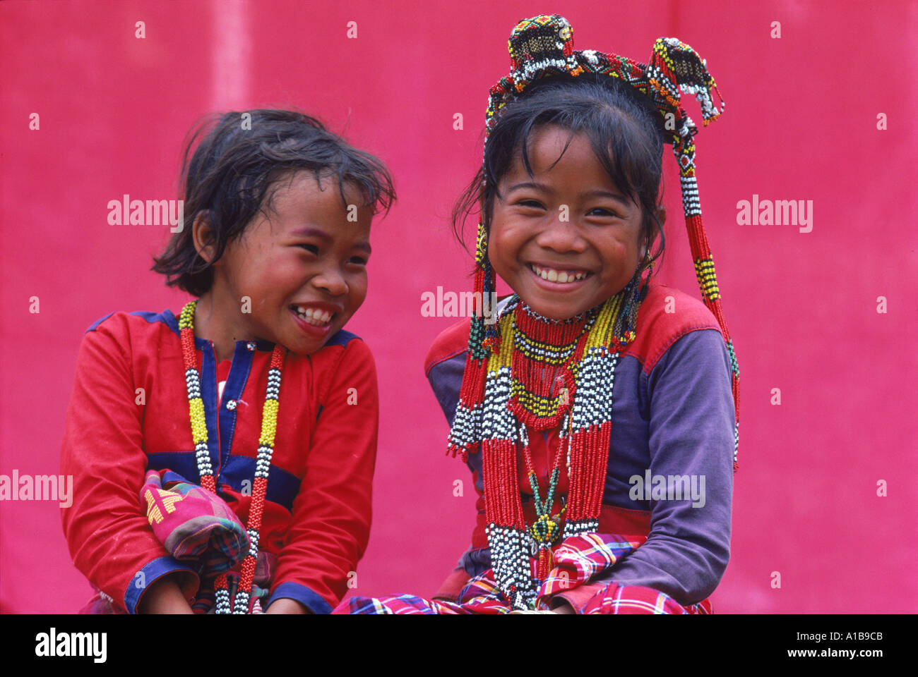 Portrait of two smiling children of the Kalagan tribe famous for Eric an ethnic dance of joy and happiness at Cotabato on Stock Photo