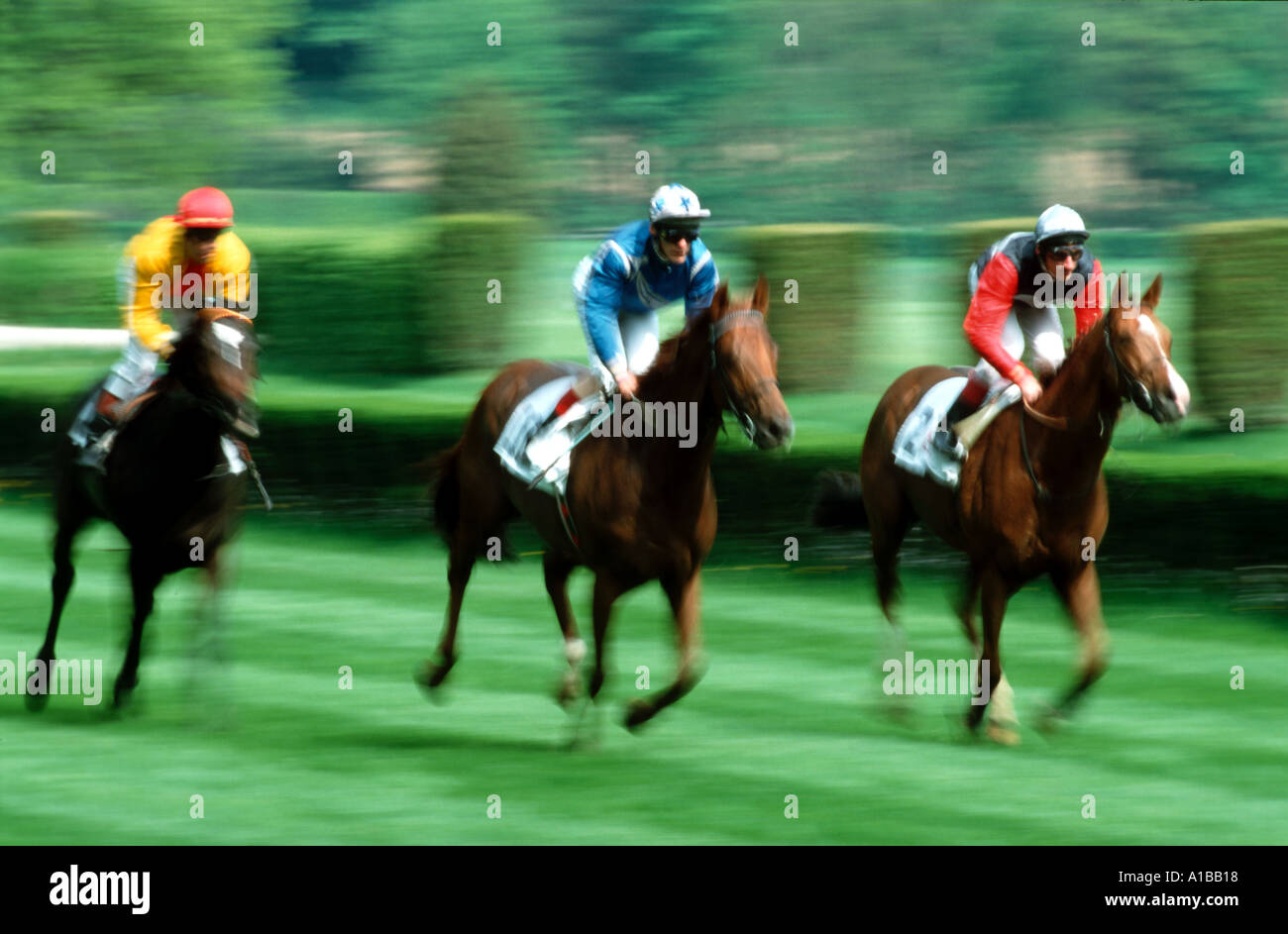 Jockeys riding race horses hi-res stock photography and images - Alamy