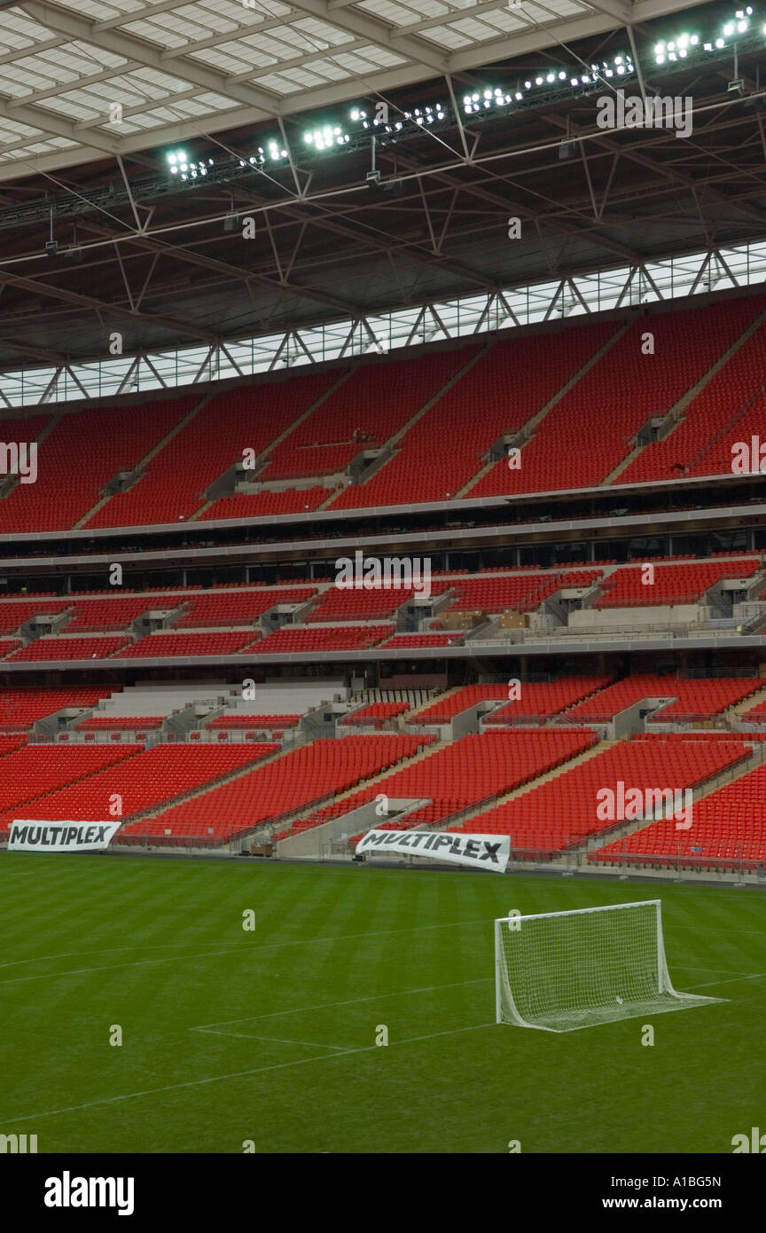 Pitch and seating inside New wembley Stadium including the players tunnel and the royaal box Stock Photo