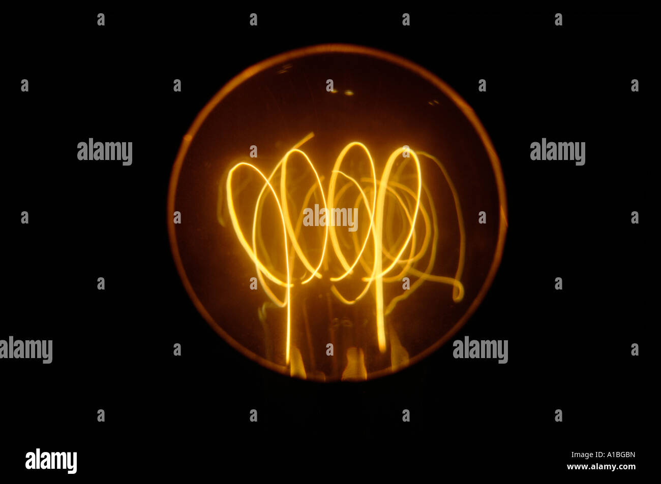 bulb switched on incandescent filament Stock Photo - Alamy