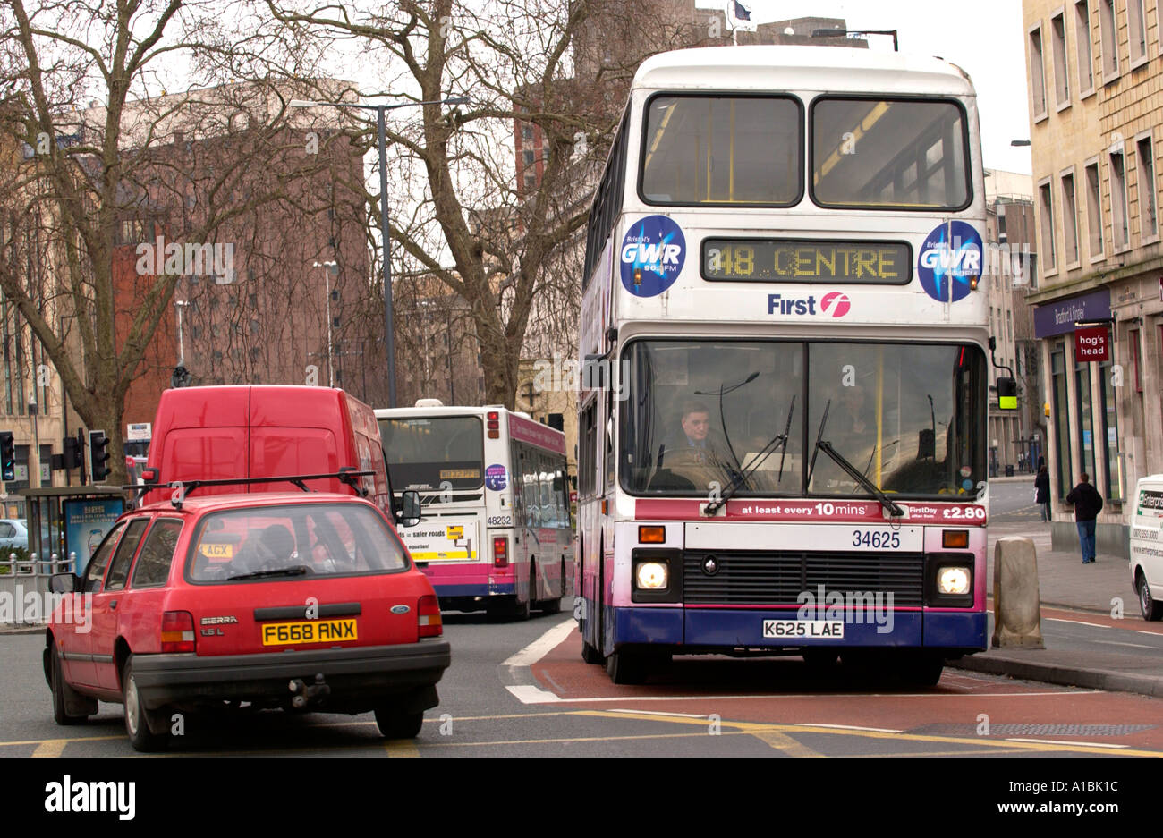 Buses using dedicated bus lanes in Bristol city centre England UK Stock