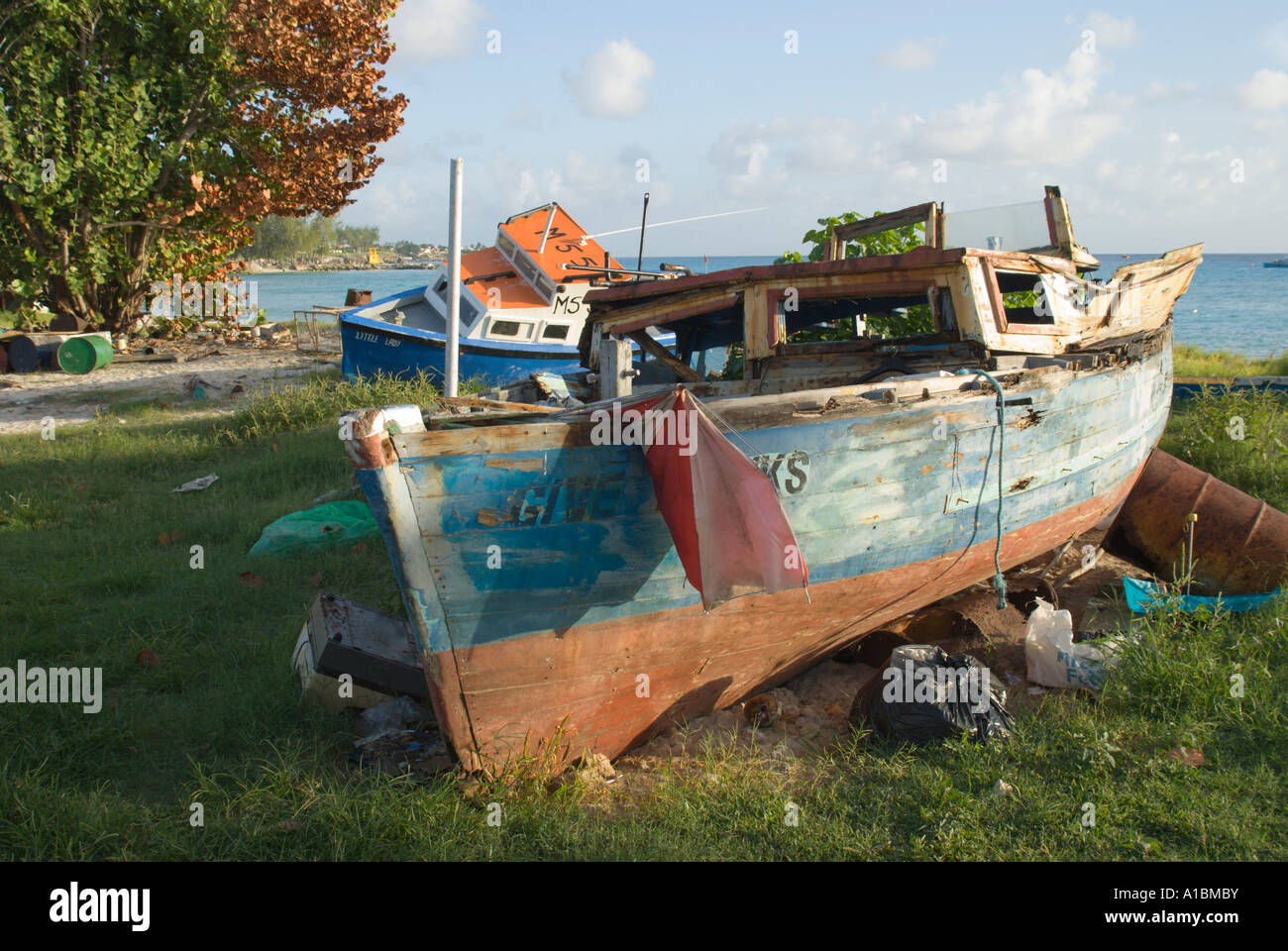 Barbados old fishing boat beached at Oistins harbour Stock Photo Alamy