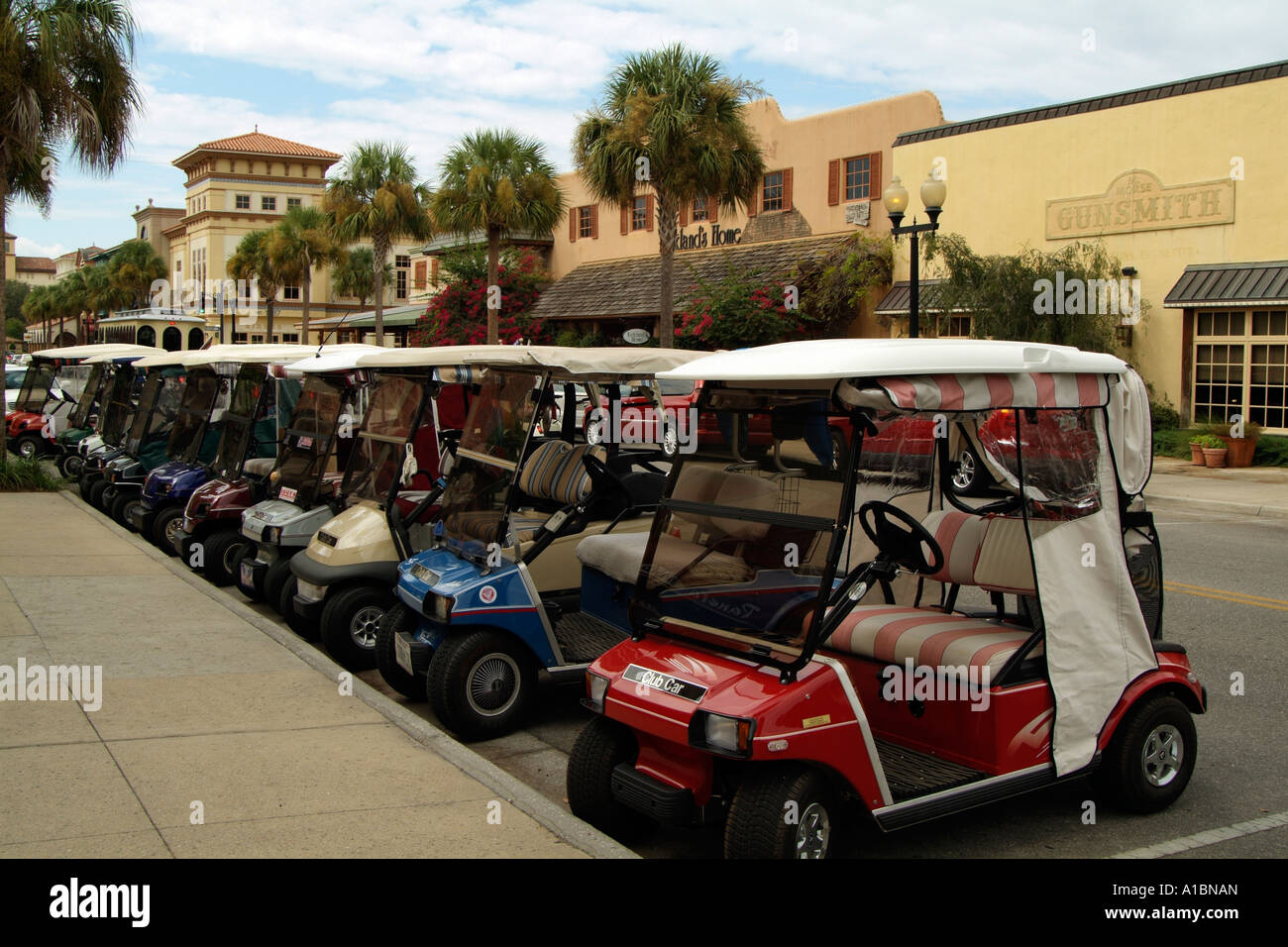 Club carts line the street in Spanish Springs Village Florida . Golf