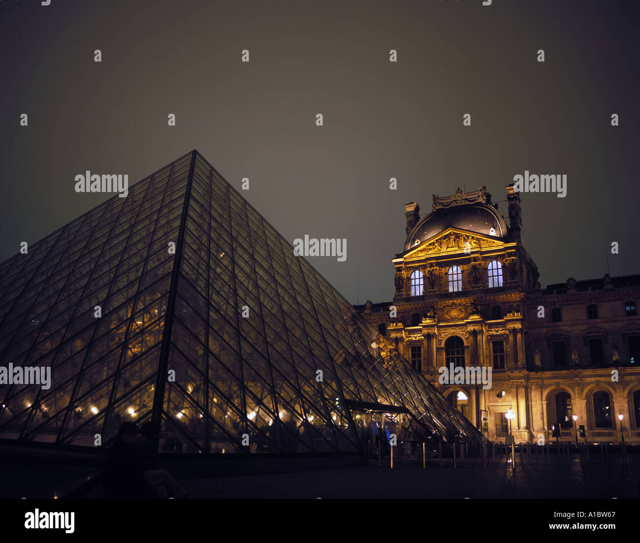 The Glass Pyramid at the Louvre Art Museum in Paris France Stock Photo