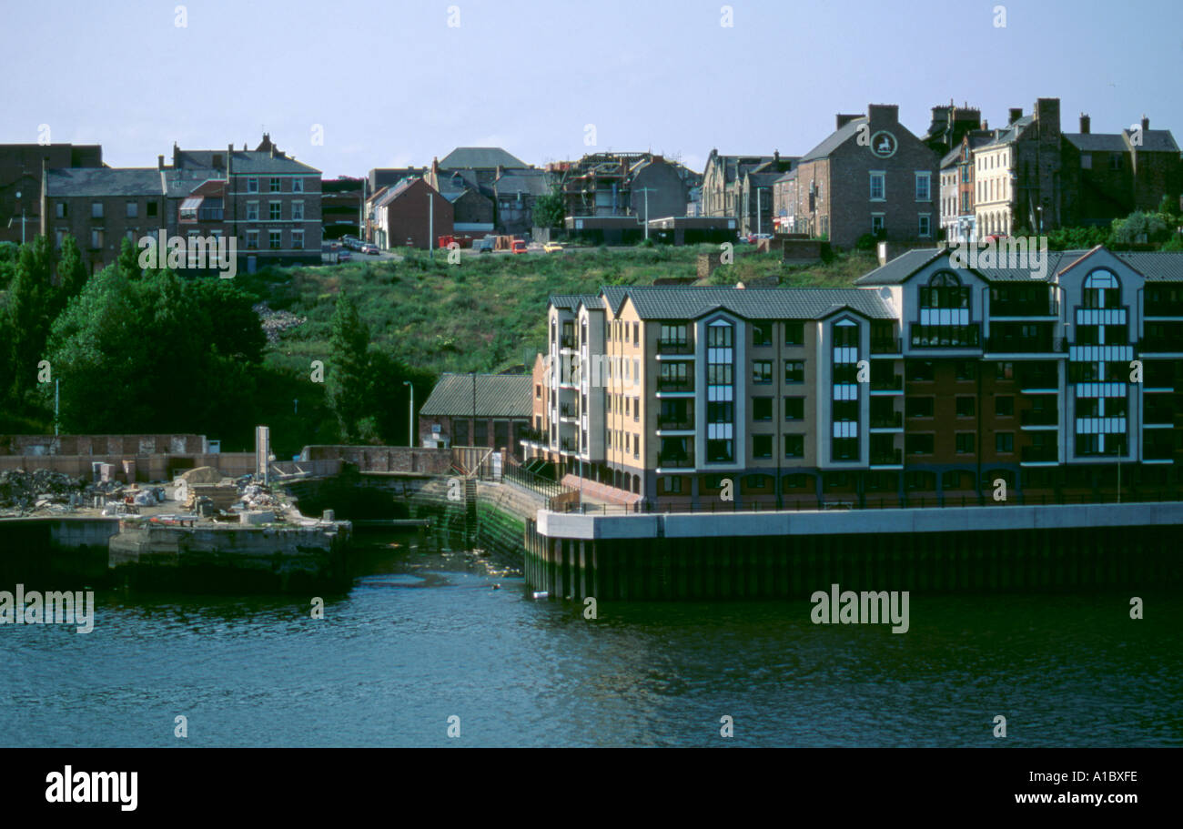 New riverside flats built adjacent to an old dry dock, North Shields, Tyne and Wear, England, UK. Stock Photo