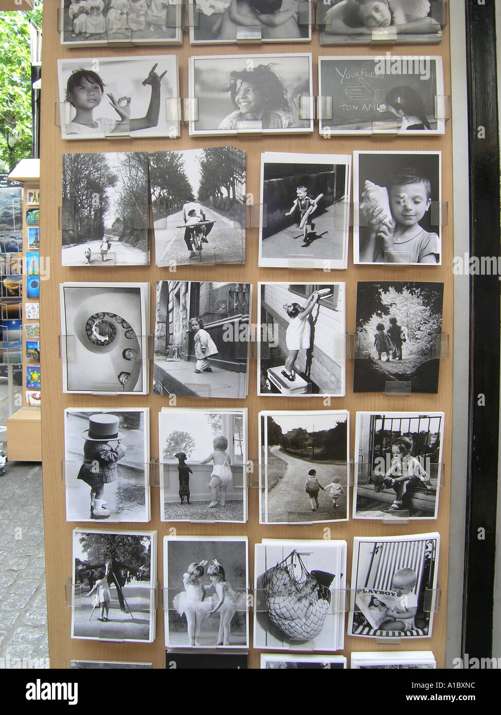 typical Parisian postcard kiosk on pavement near Centre Pompidou Stock Photo