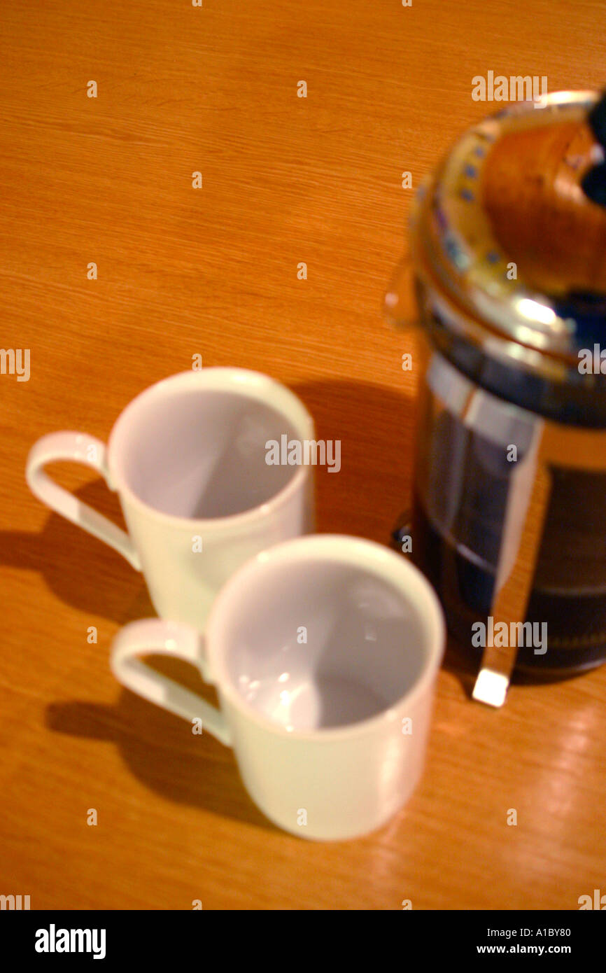 Cafetiere coffee maker and cups Stock Photo Alamy