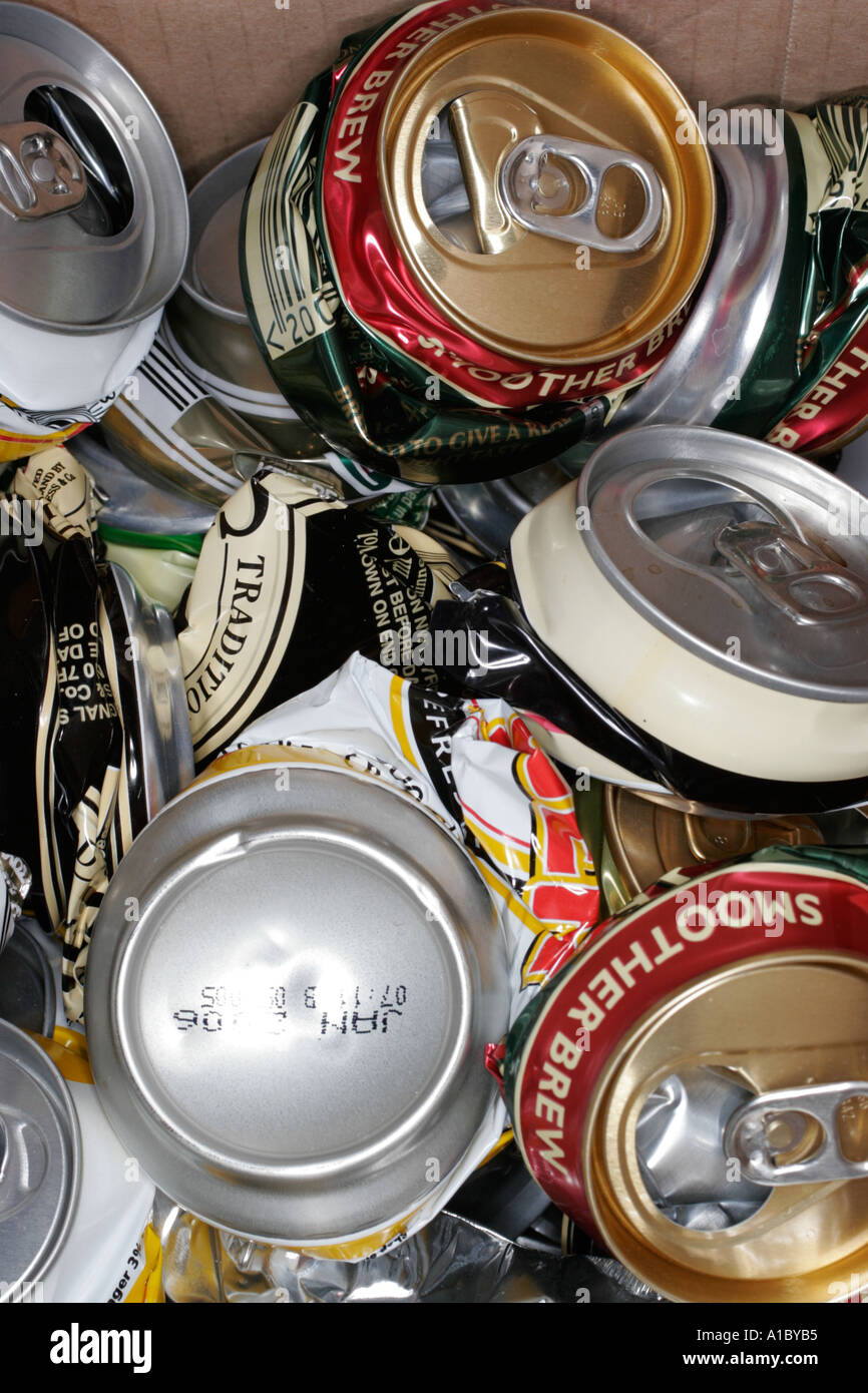 Crushed drink beer cans ready to be recycled tin steel aluminium aluminum environment environmental Stock Photo