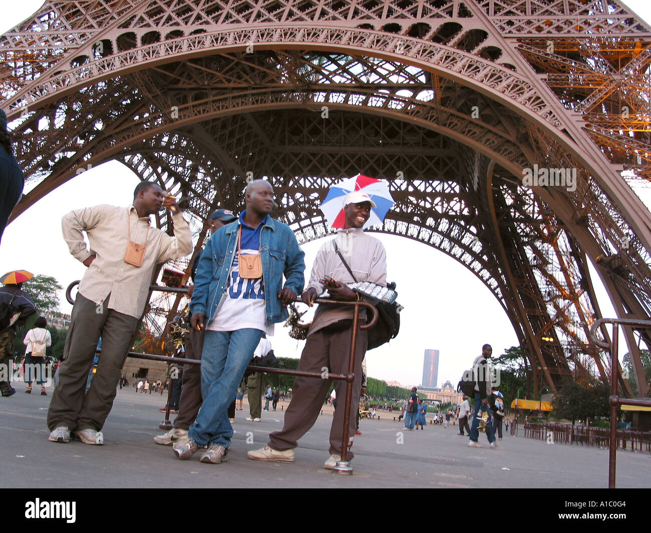 African street vendors under Eiffel Tower Paris France Stock Photo