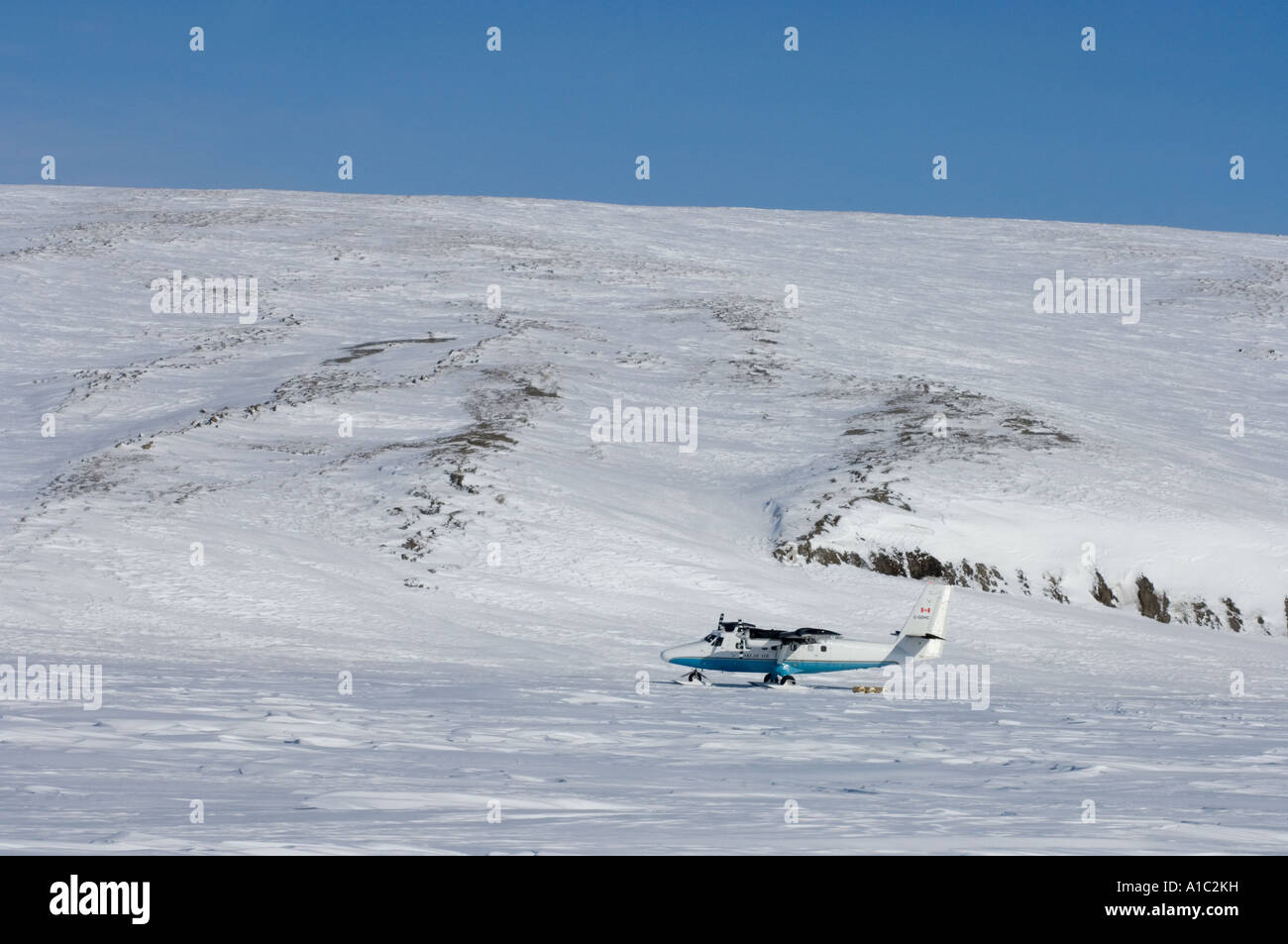 airplane dropping off supplies on Herschel Island off the Mackenzie