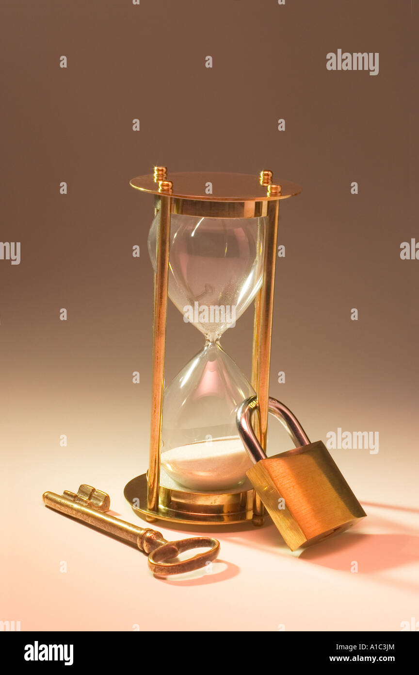 Hourglass with Lock and Key Stock Photo Alamy