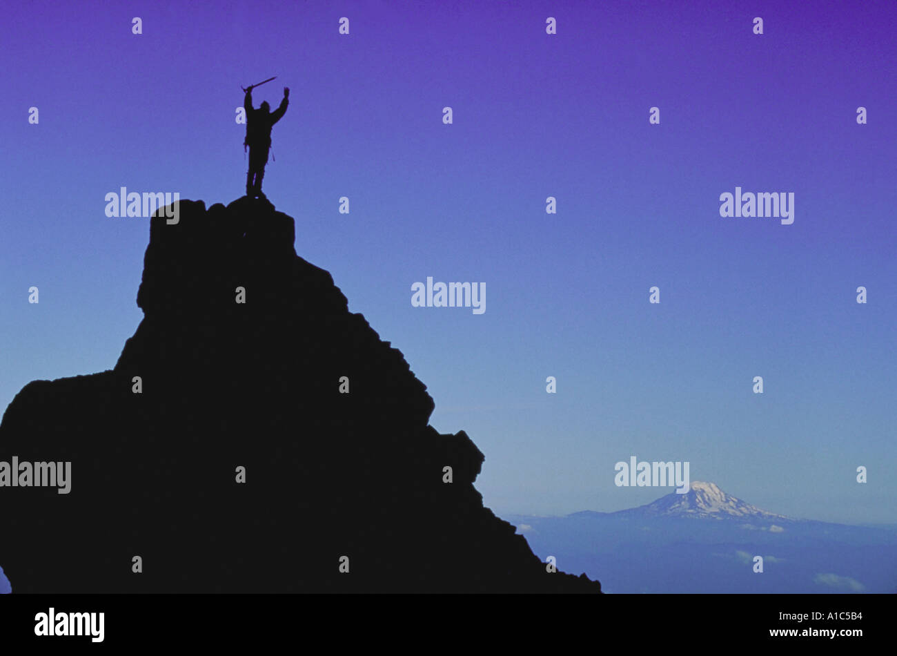 Victorious mountain climber hi-res stock photography and images - Alamy
