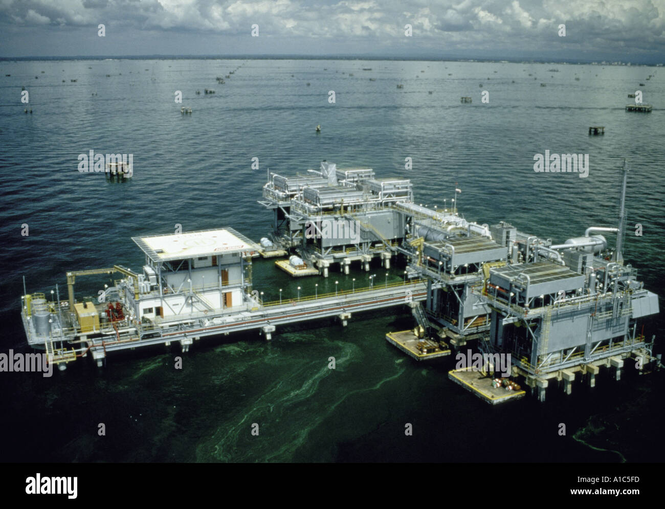 Gas compression plant run by the Lagoven Oil Company on Lake Maracaibo Zulia State Venezuela Stock Photo